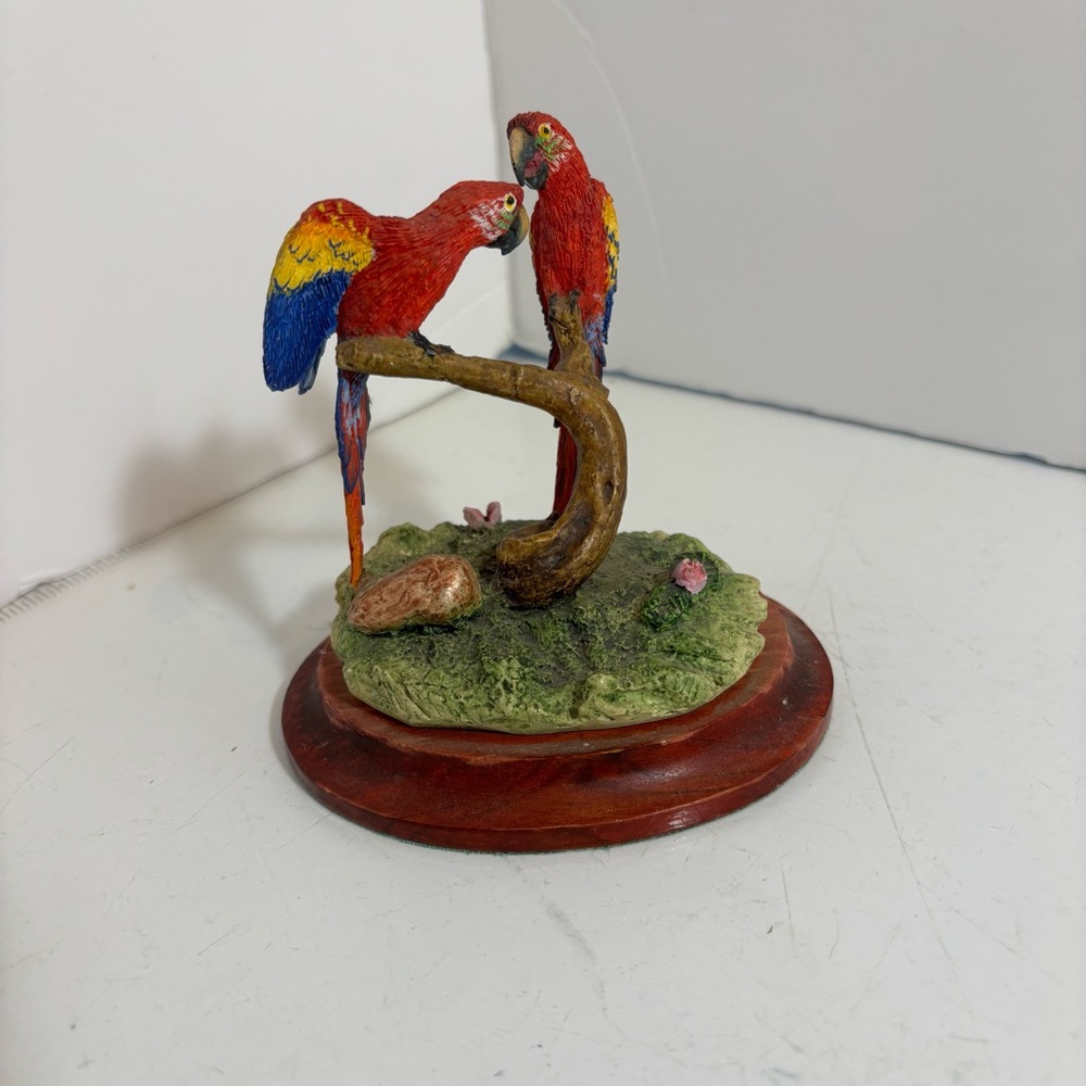 Vintage macaw parrots perched on branch resin figurine decorโ
